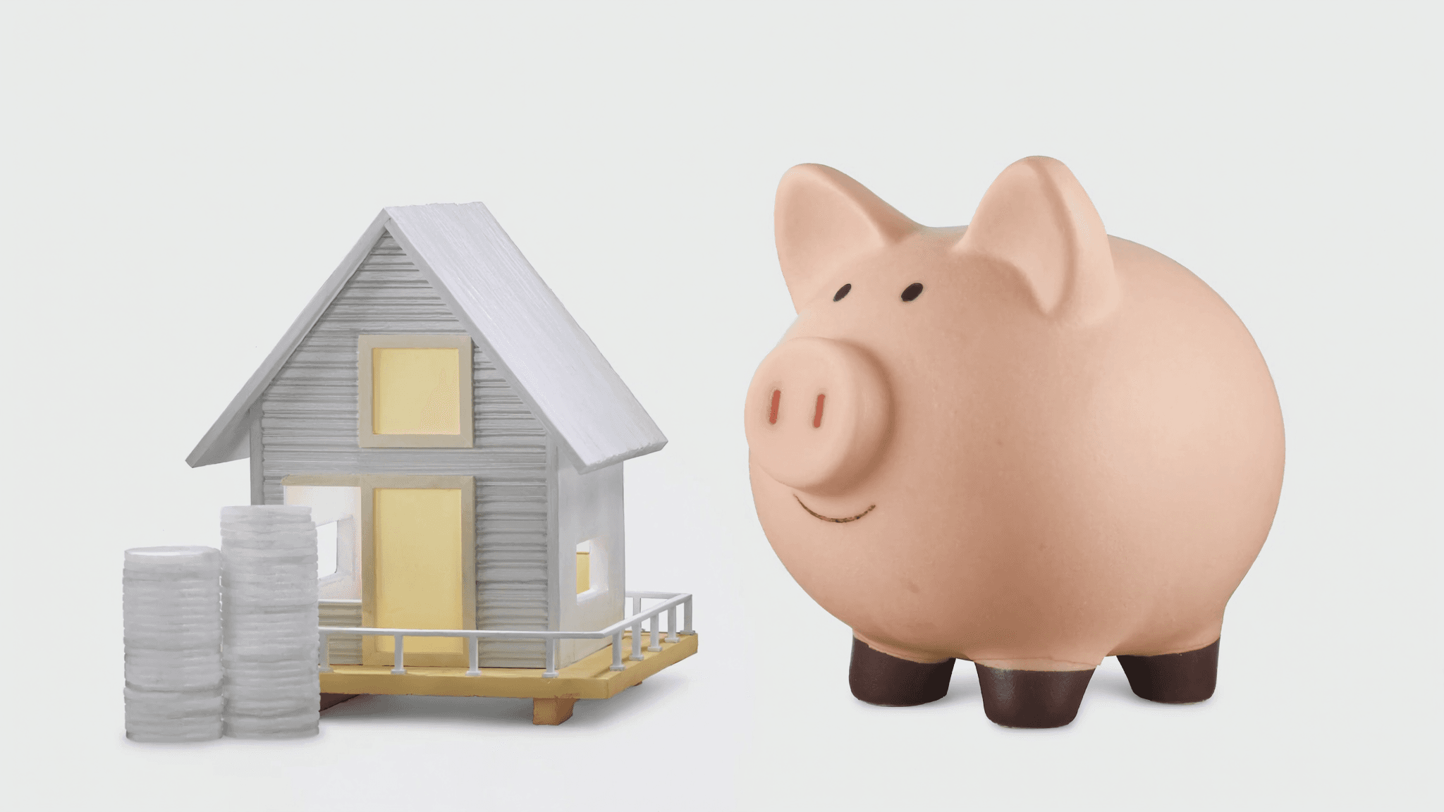 Sparschwein und Hausmodell - Eigenkapital für Immobilienkauf